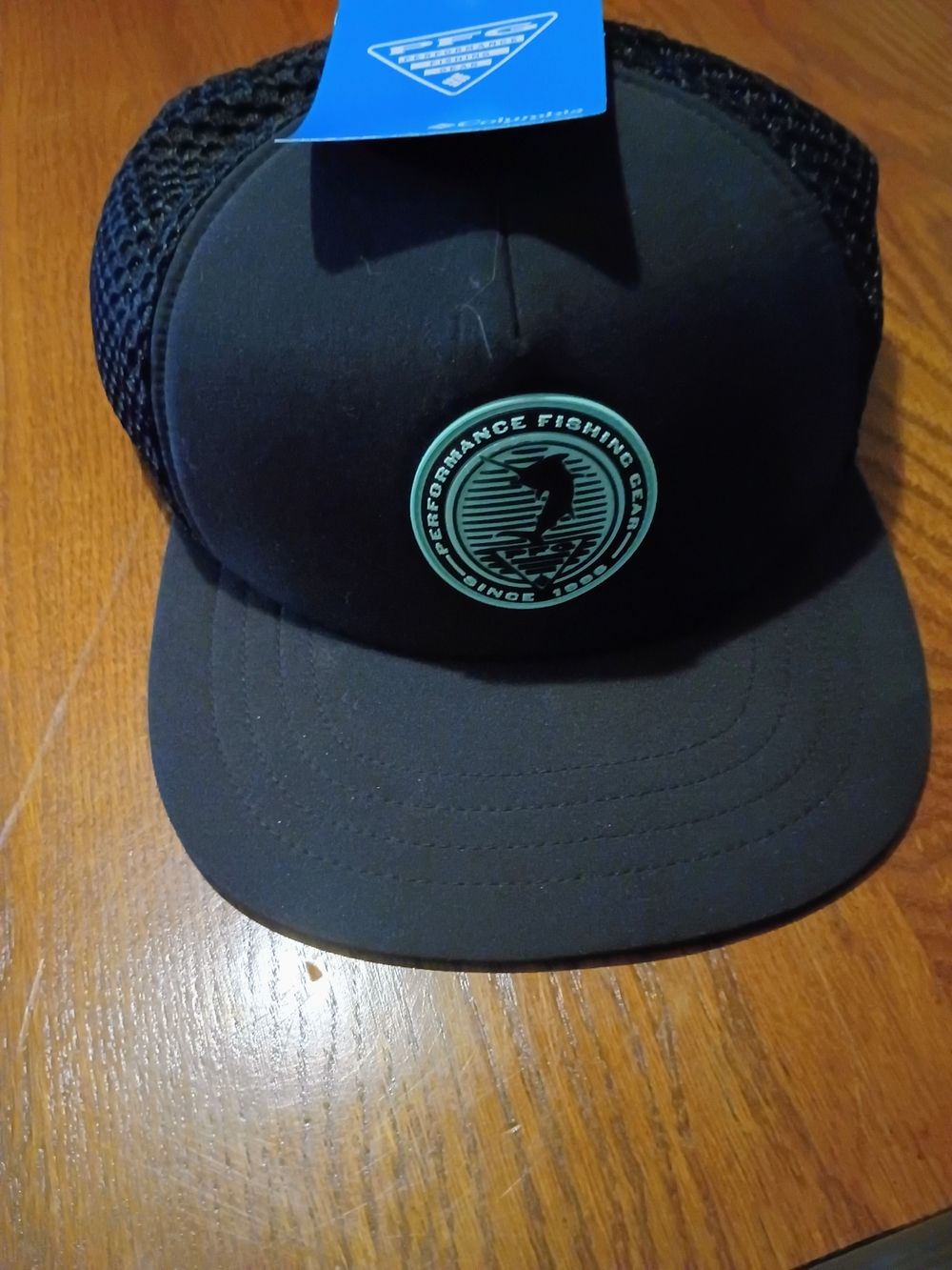 Columbia Black Trucker Hat with Aqua Logo Patch